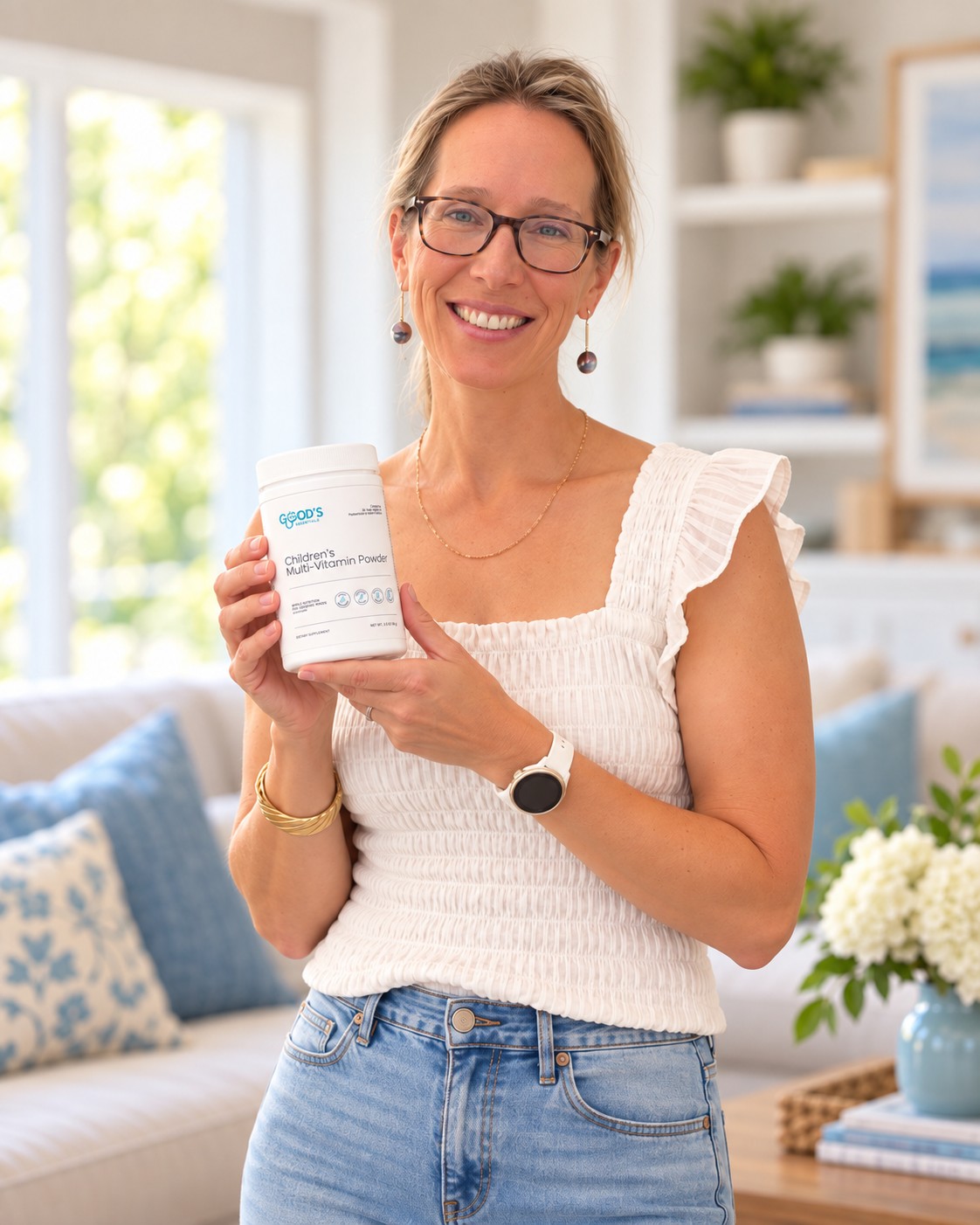 Dr. Katie Good holding Children's Multi-Vitamin Powder